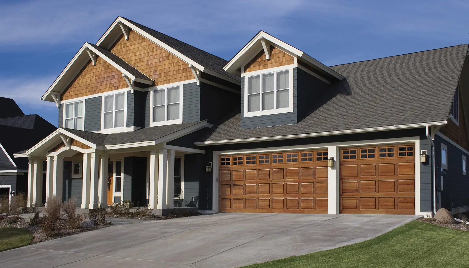 Clopay Classic Wood Collection - Real Wood Raised Panel & Flush