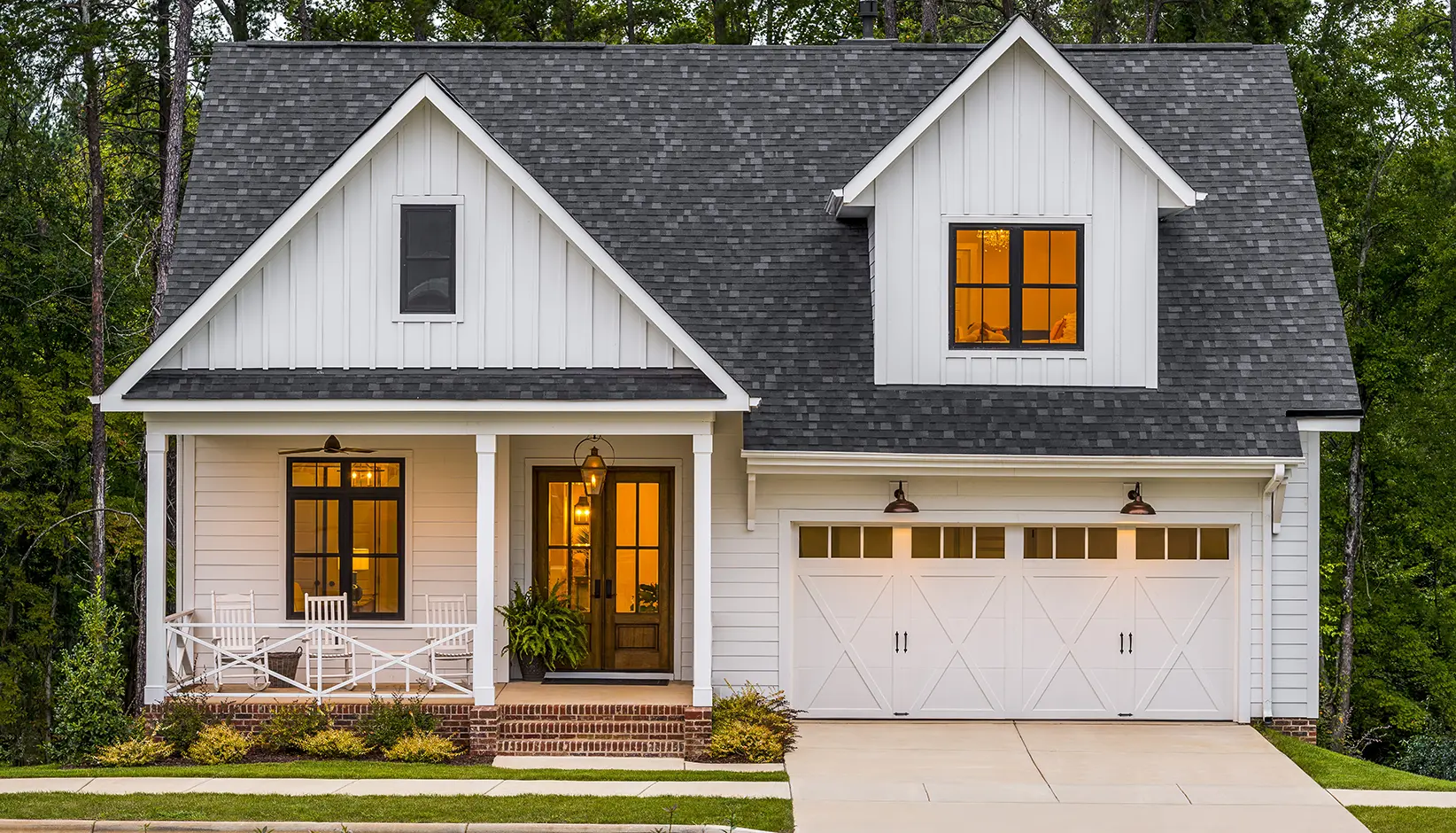 Clopay Coachman carriage house garage door installed on a home